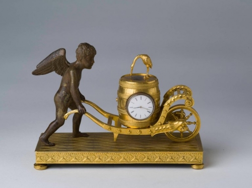 An Empire Ormolu and Patinated Bronze Figural Mantel Clock